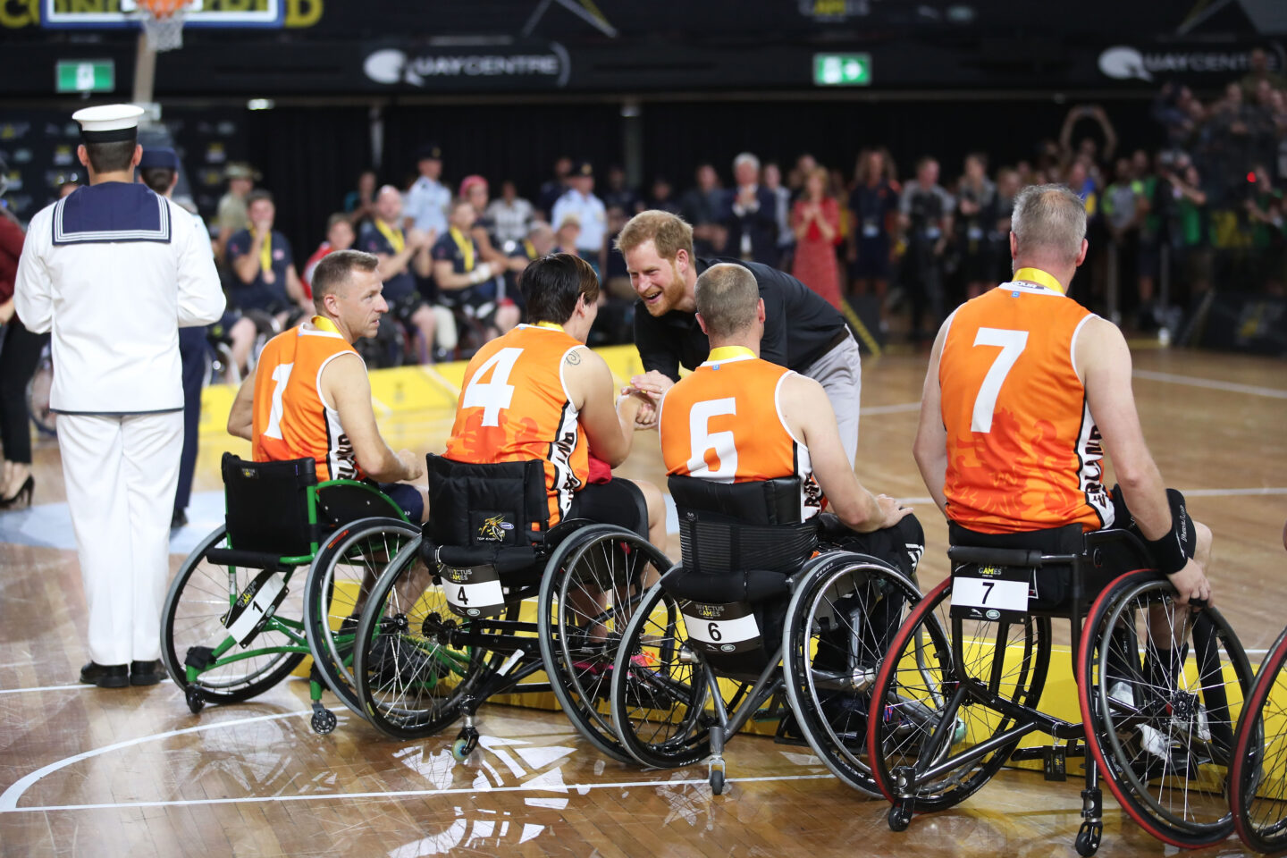 Prince Harry, Duke of Sussex congratulates the silver medallists the Netherlands after the Wheelchair Basketball gold medal match during day eight of the Invictus Games Sydney 2018 at on October 27, 2018 in Sydney, Australia.